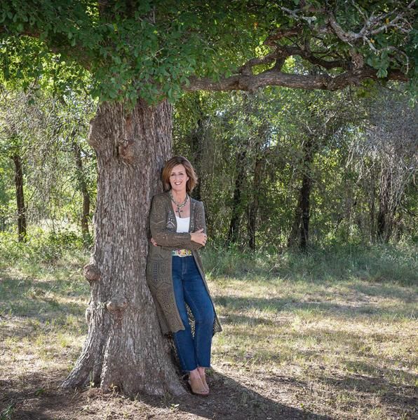 Kimberly Benge under tree